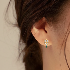 Yellow Gold Diamond Earring close up shot | under 40k