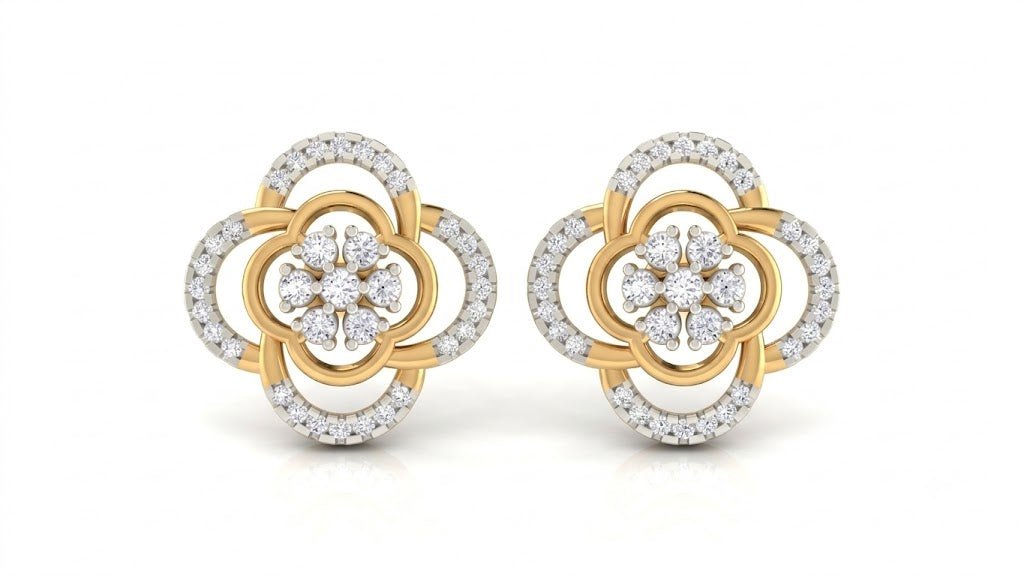 A pair of two-tone yellow gold and diamond stud earrings with a floral design on a white background.