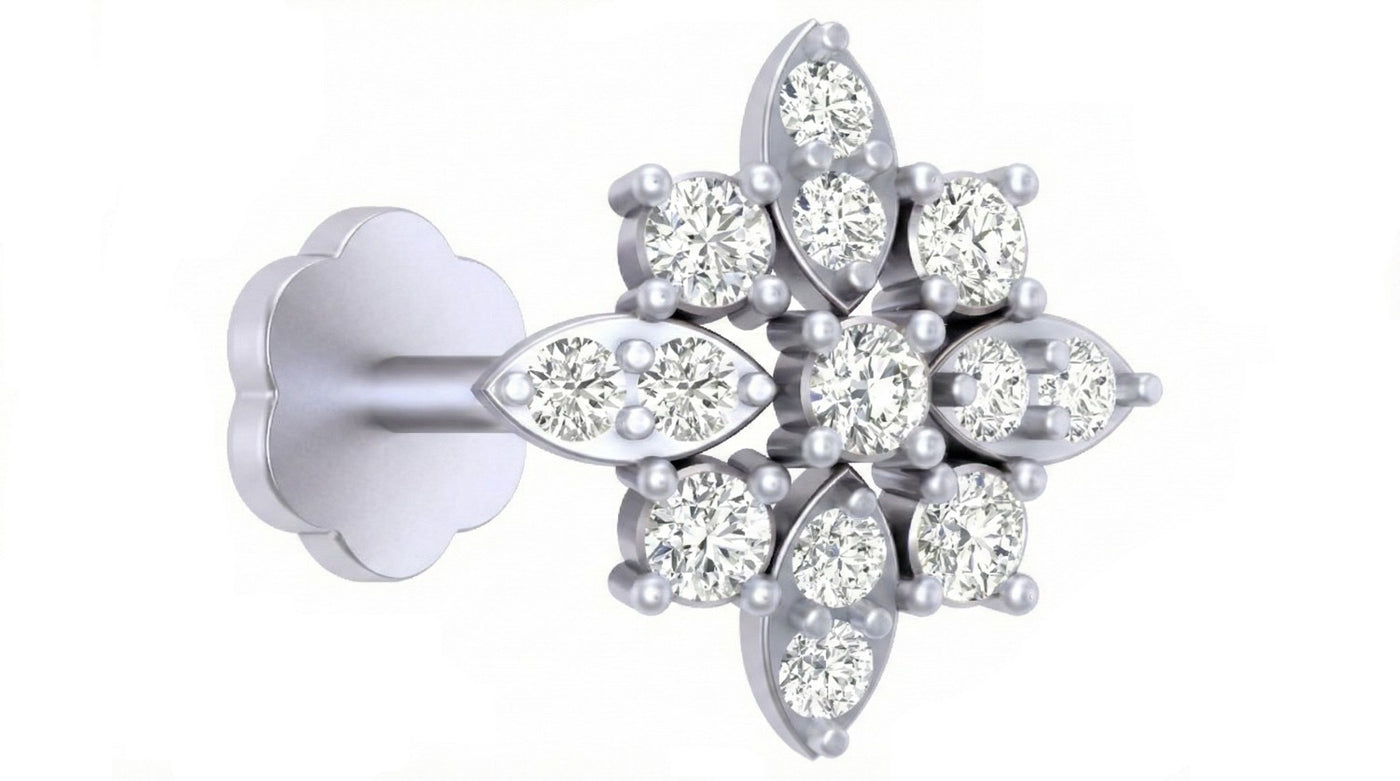 white gold and diamond stud nose pin on a white background