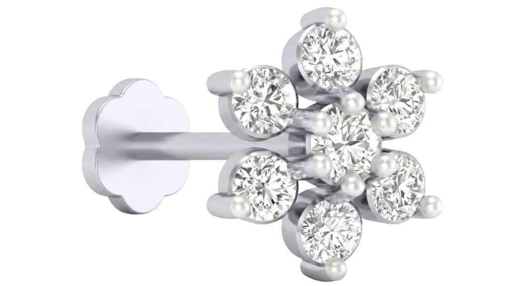 white gold and diamond stud nose pin on a white background