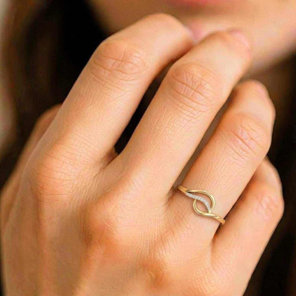 Close-up shot of a gold ring with diamond accents ring.
