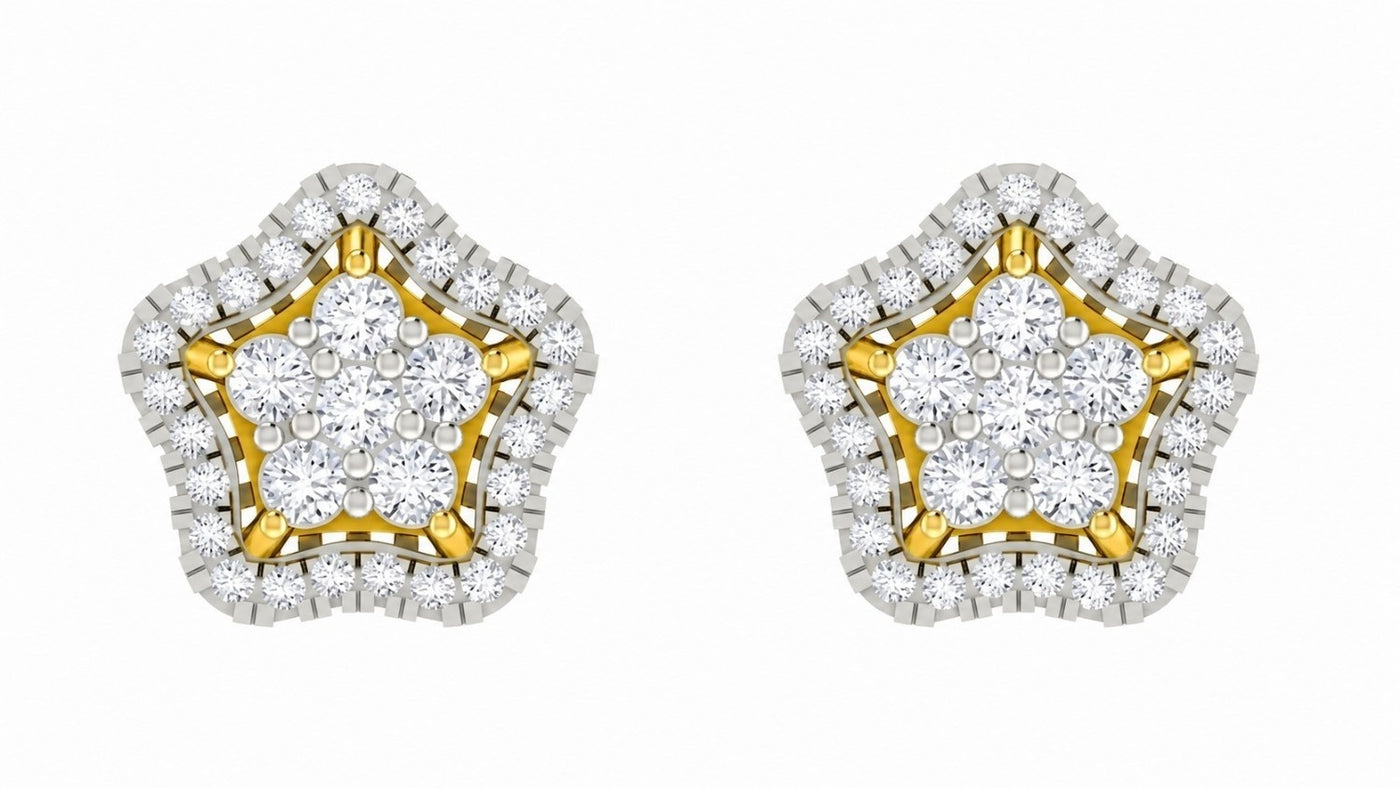 Star-shaped earrings with yellow gold and diamond detailing on a white background