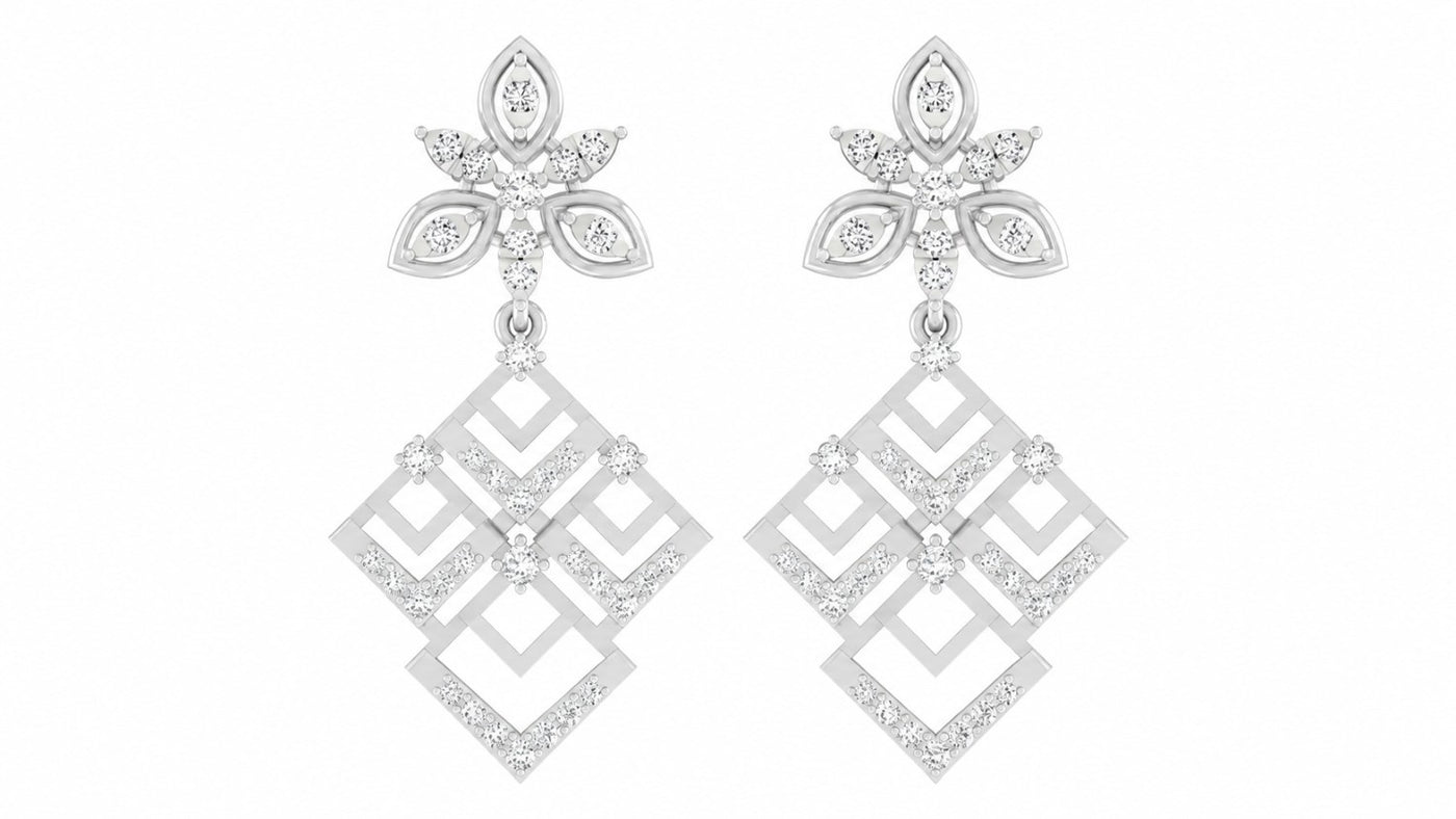 White gold and diamond earrings on a white background
