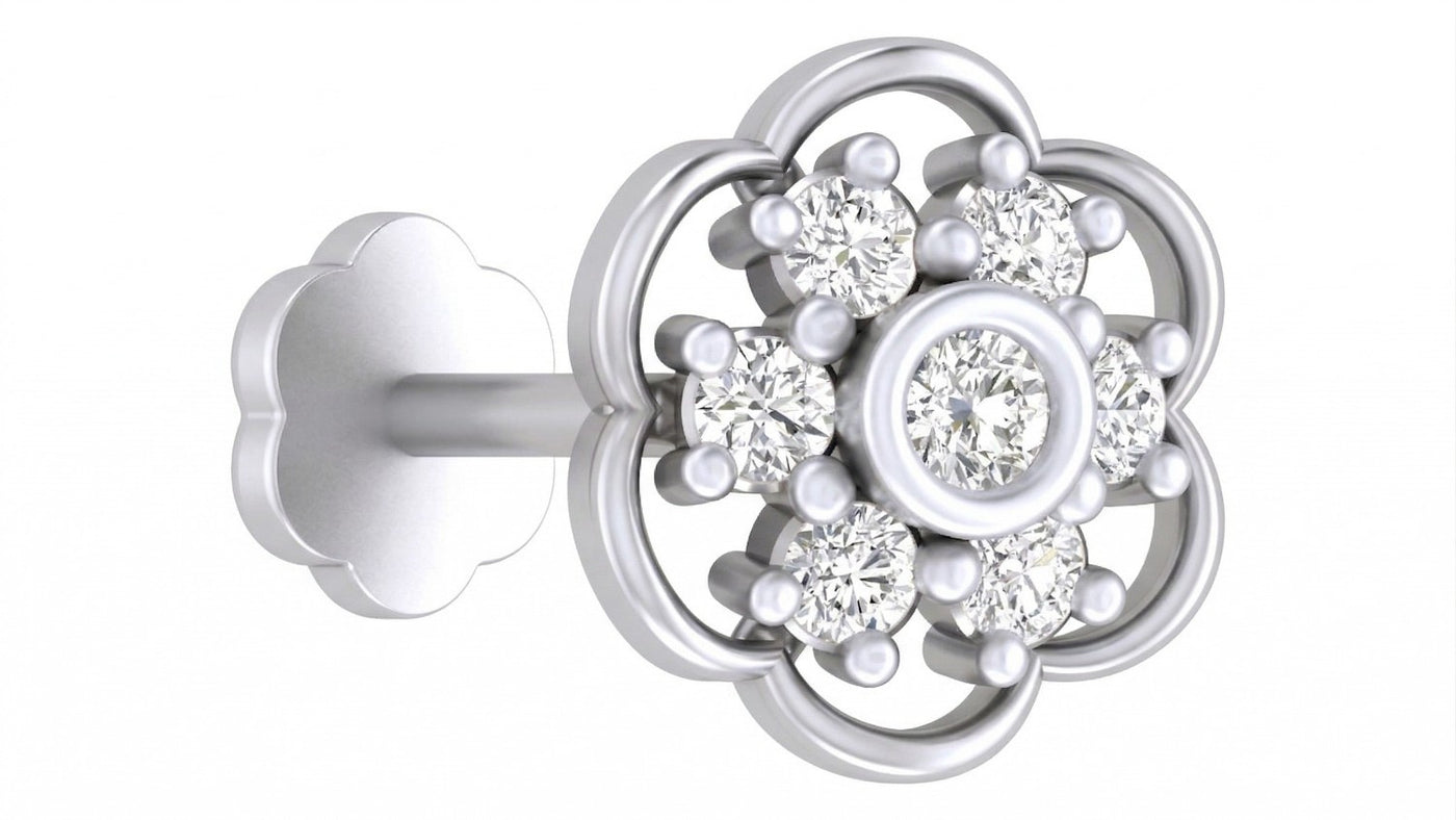 A White gold and diamond stud nose pin and  flower-shaped stud with a central round diamond, surrounded by smaller diamonds and white pearl-like accents, on a plain white background.
