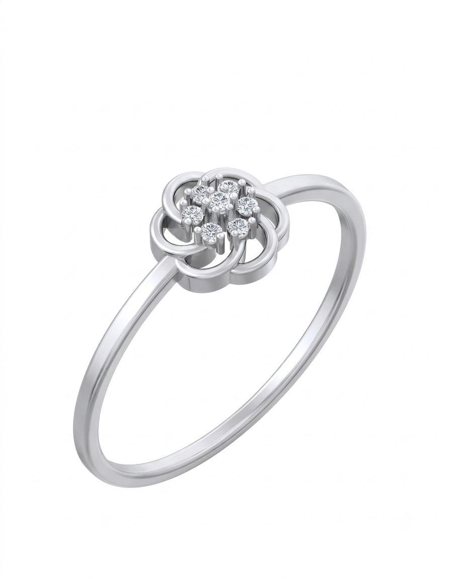 White gold ring with diamond heart-shaped center on a white background