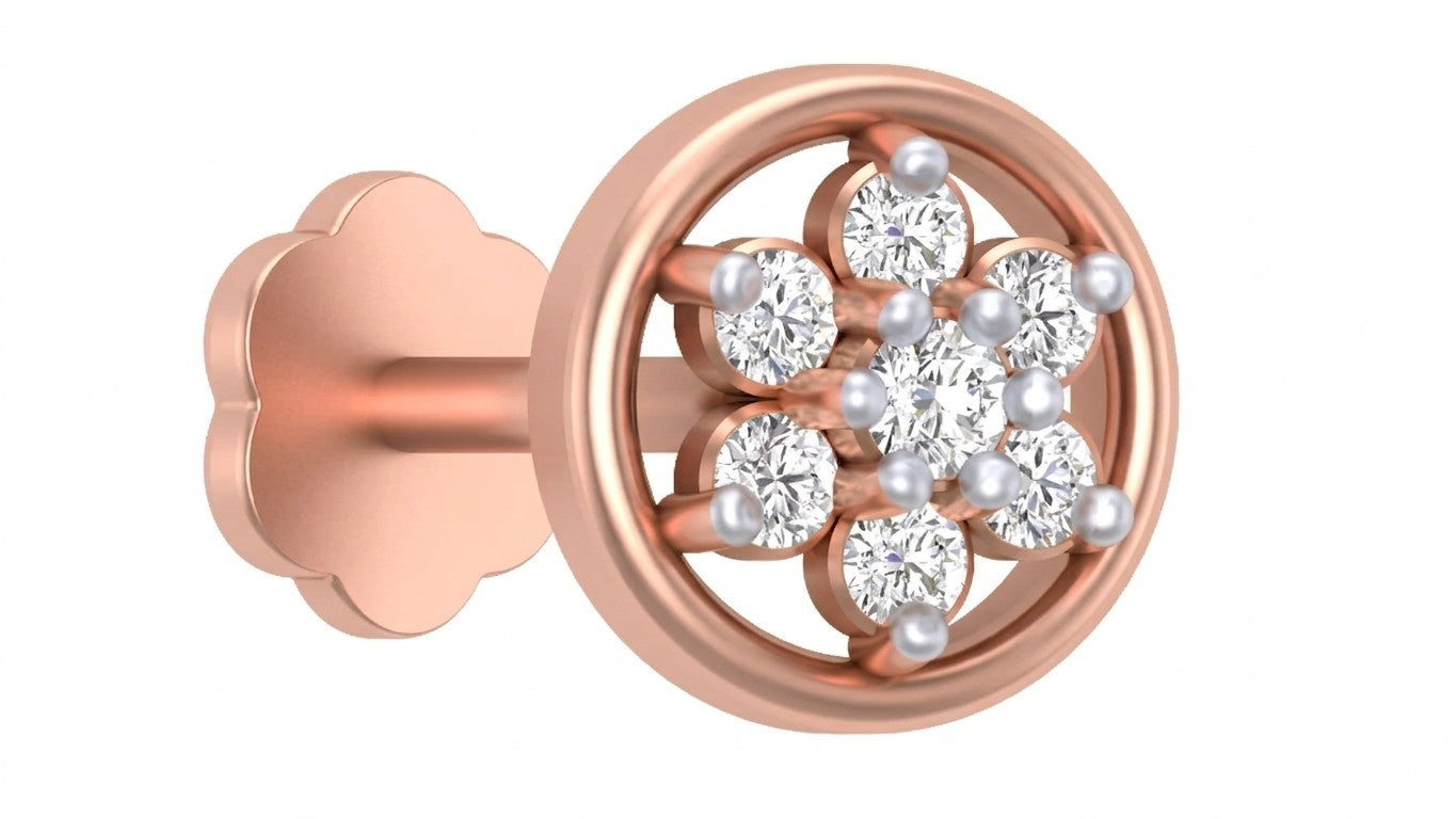 Rose gold and diamond stud nose pin on a brown fabric background