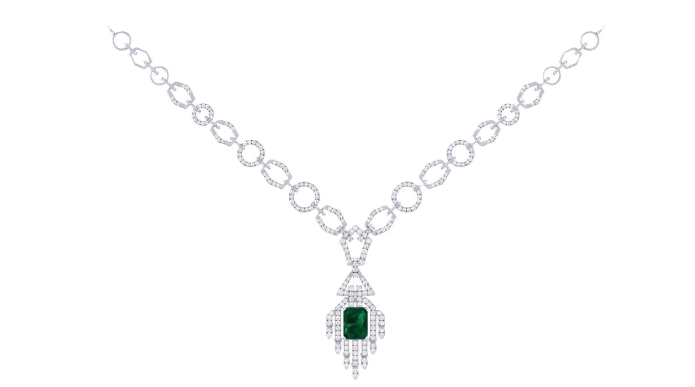 White gold and diamond necklace with a green gemstone pendant on a white background