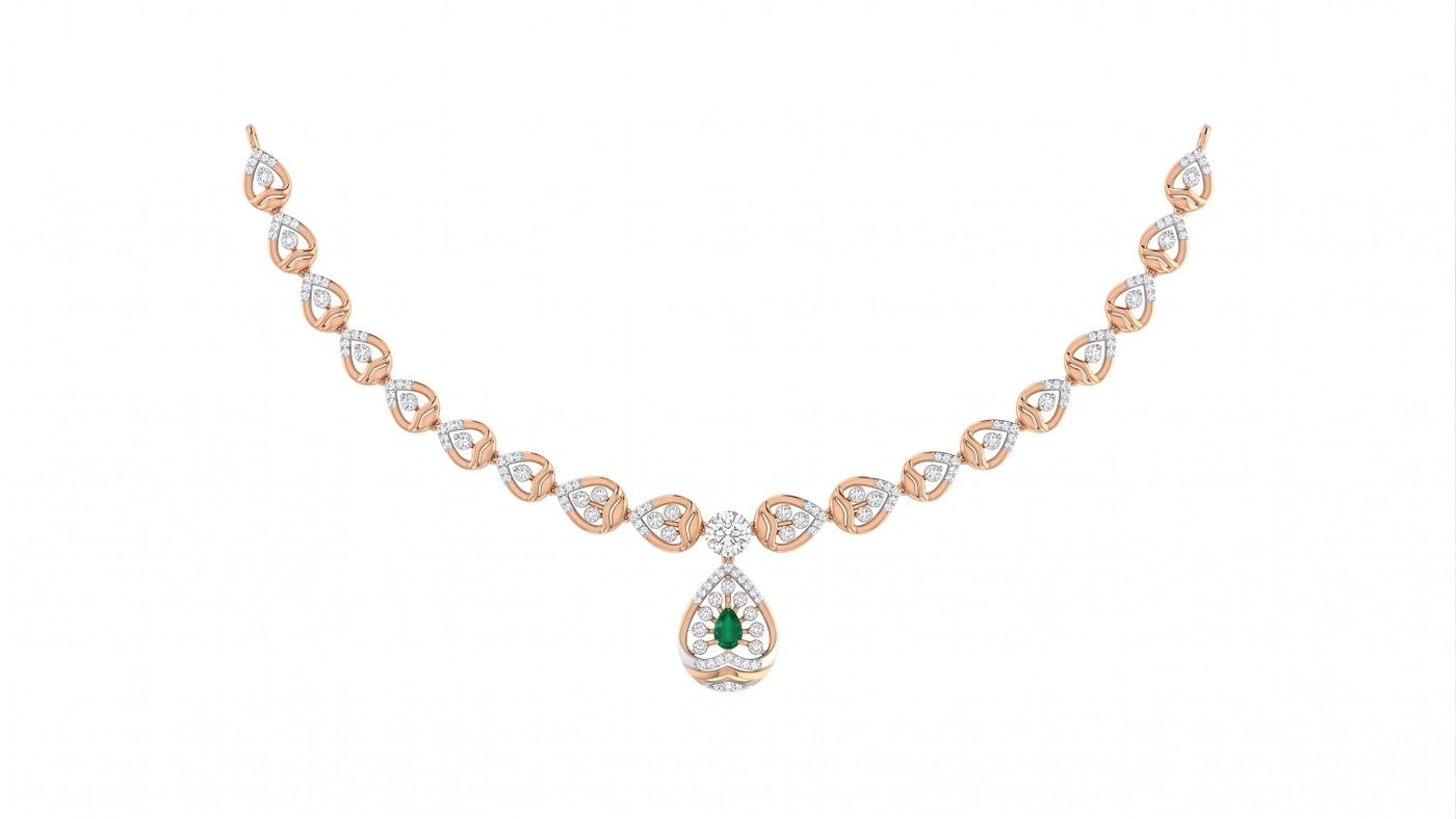 A rose gold and diamond necklace with a central teardrop-shaped green emerald pendant, displayed on a clean white background.