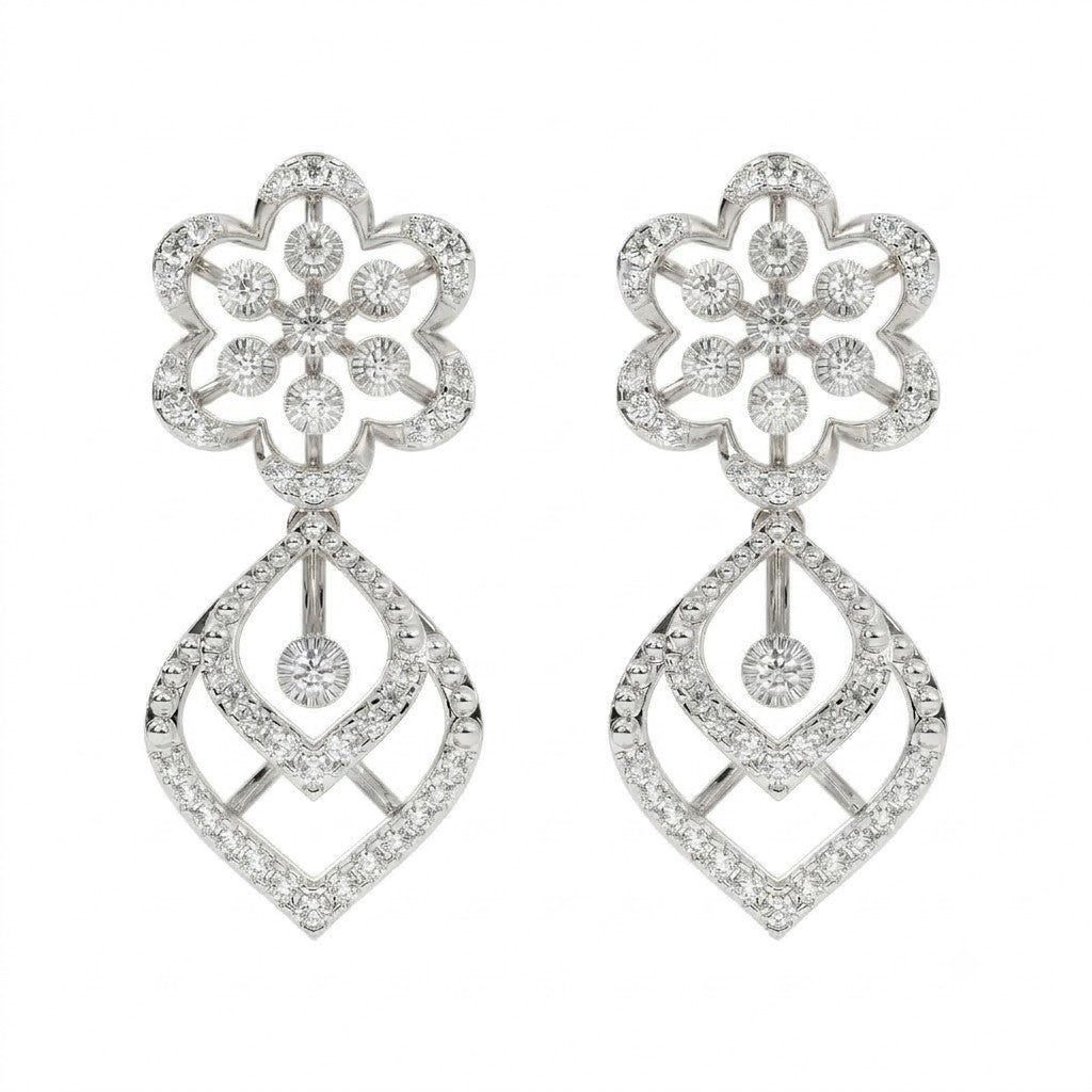Pair of white gold and diamond dangler stud earrings on a white background