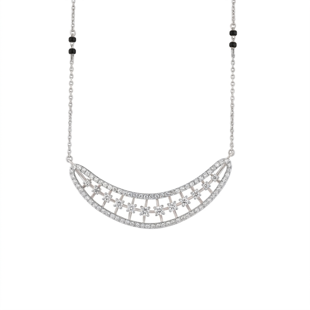 White gold and diamond mangalsutra with a crescent moon design on a white background