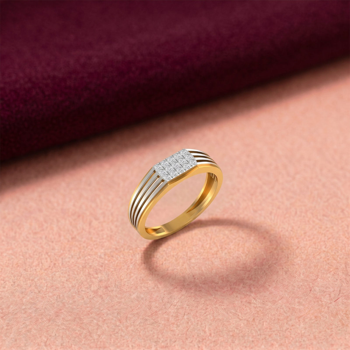 Gold and diamond band ring for men with diamond cluster on a surface.