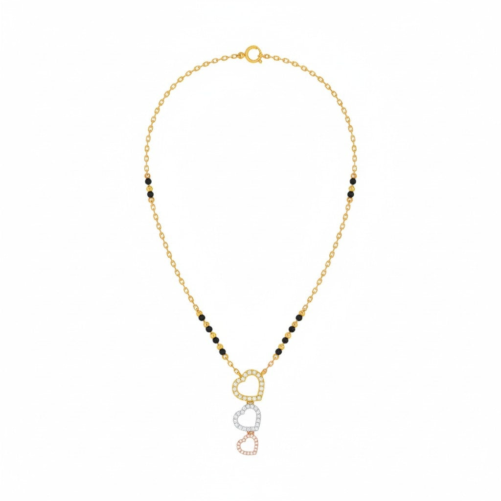 yellow gold and diamond mangalsutra with heart-shaped mangalsutra on a white background