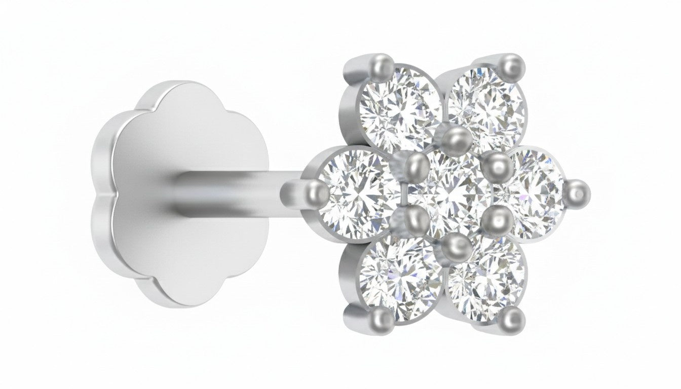 white gold and diamond stud nose pin with diamond-like stones on a white background