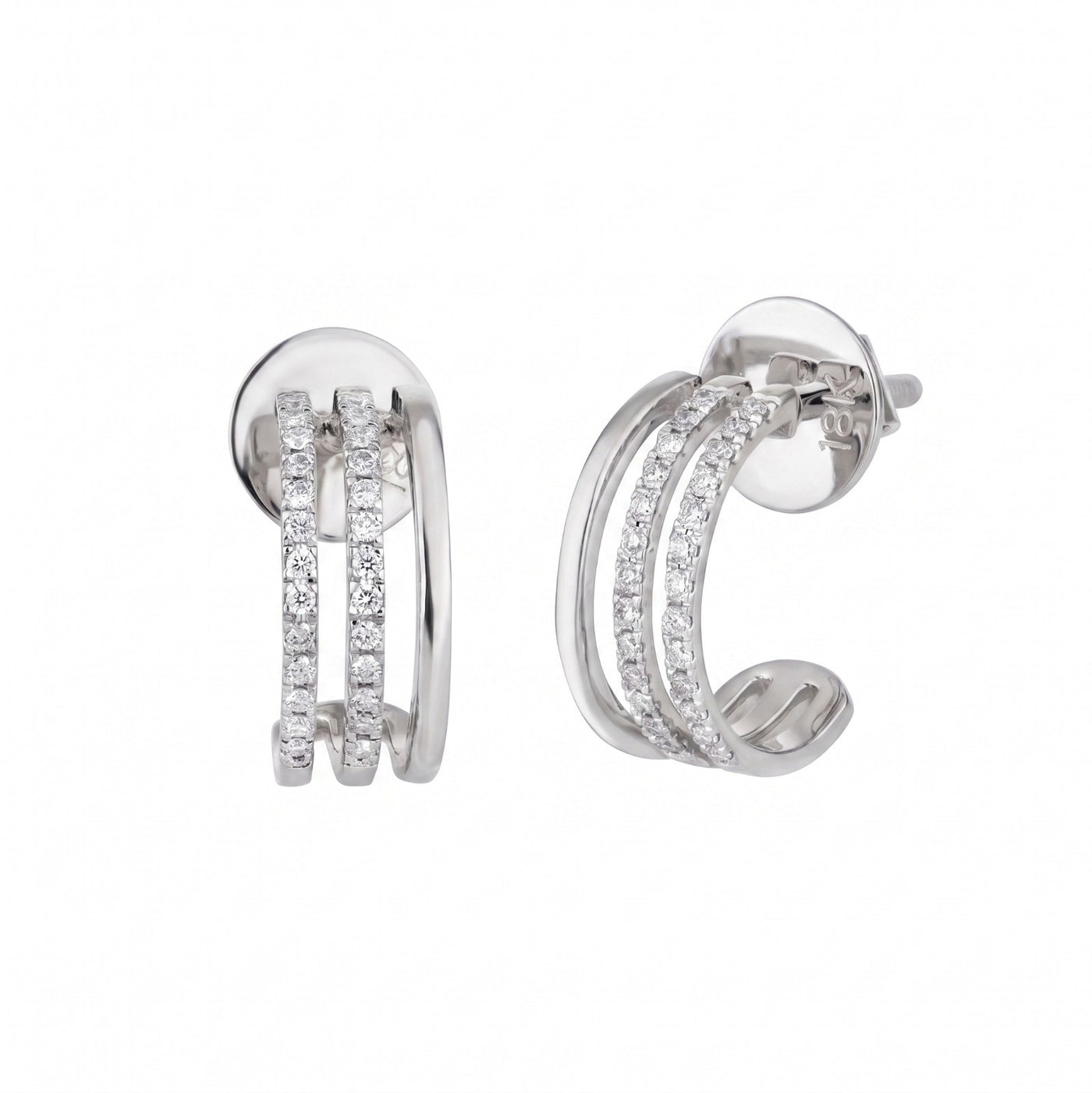 White gold hoop earrings with diamond accents on a white background


