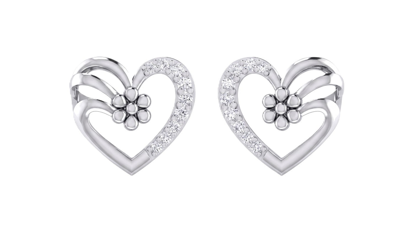 White gold and diamond heart-shaped earrings on a white background