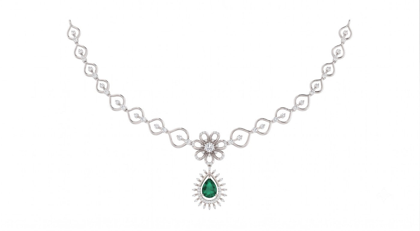 White gold necklace with a green gemstone on a white background.