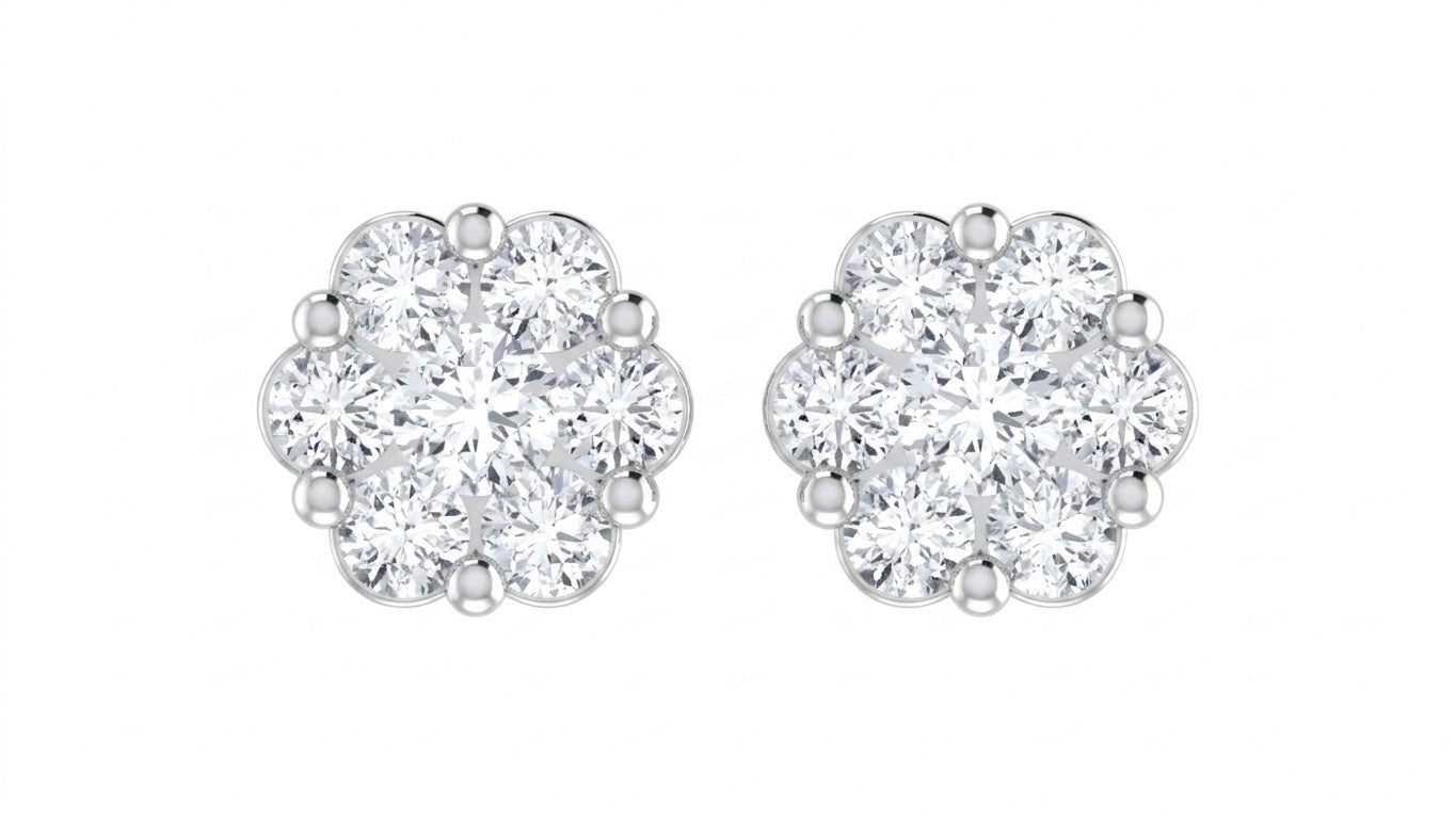 Pair of white gold and diamond earrings on a white background
