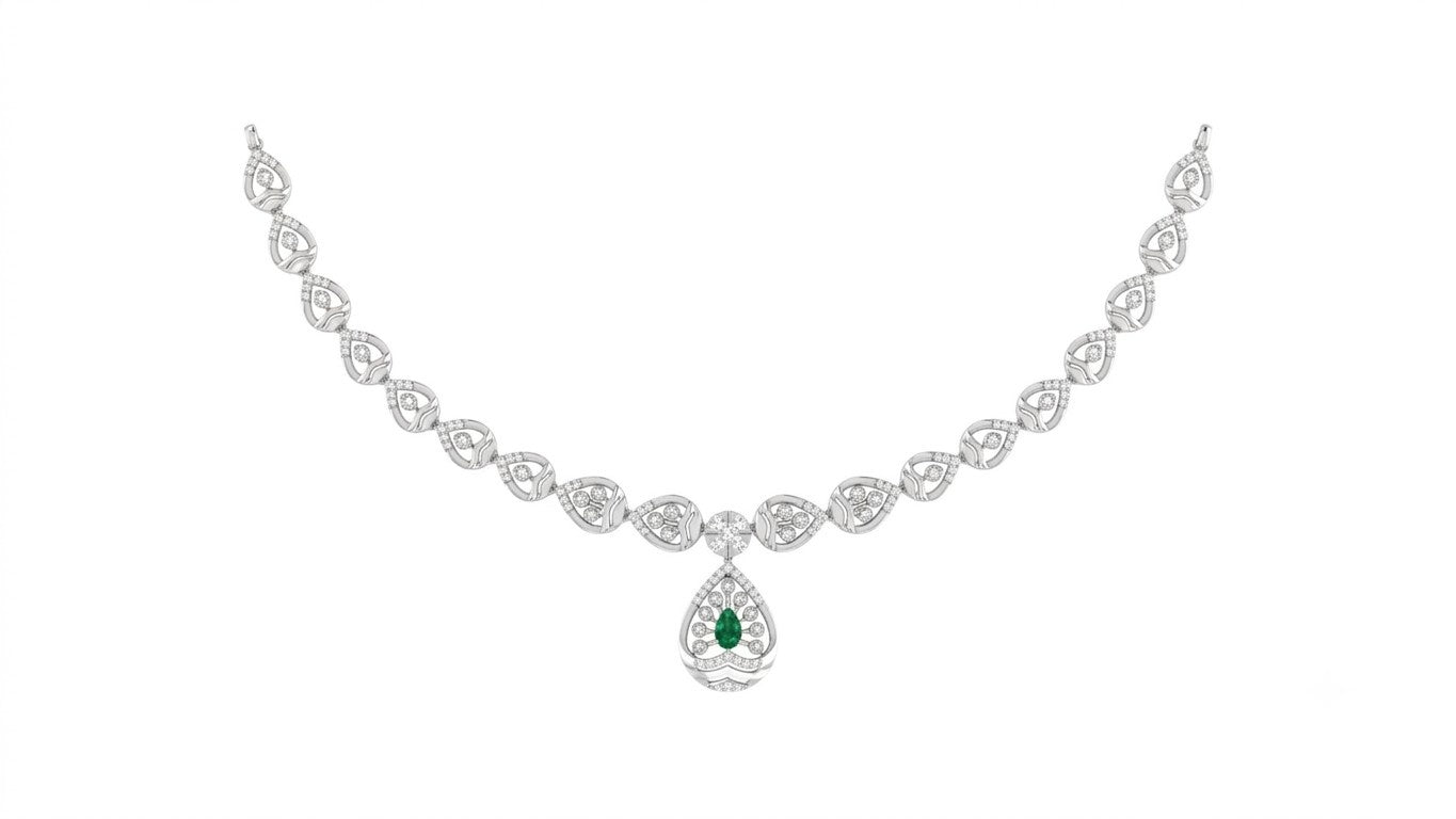A white gold and diamond necklace with a central teardrop-shaped green emerald pendant, displayed on a clean white background.