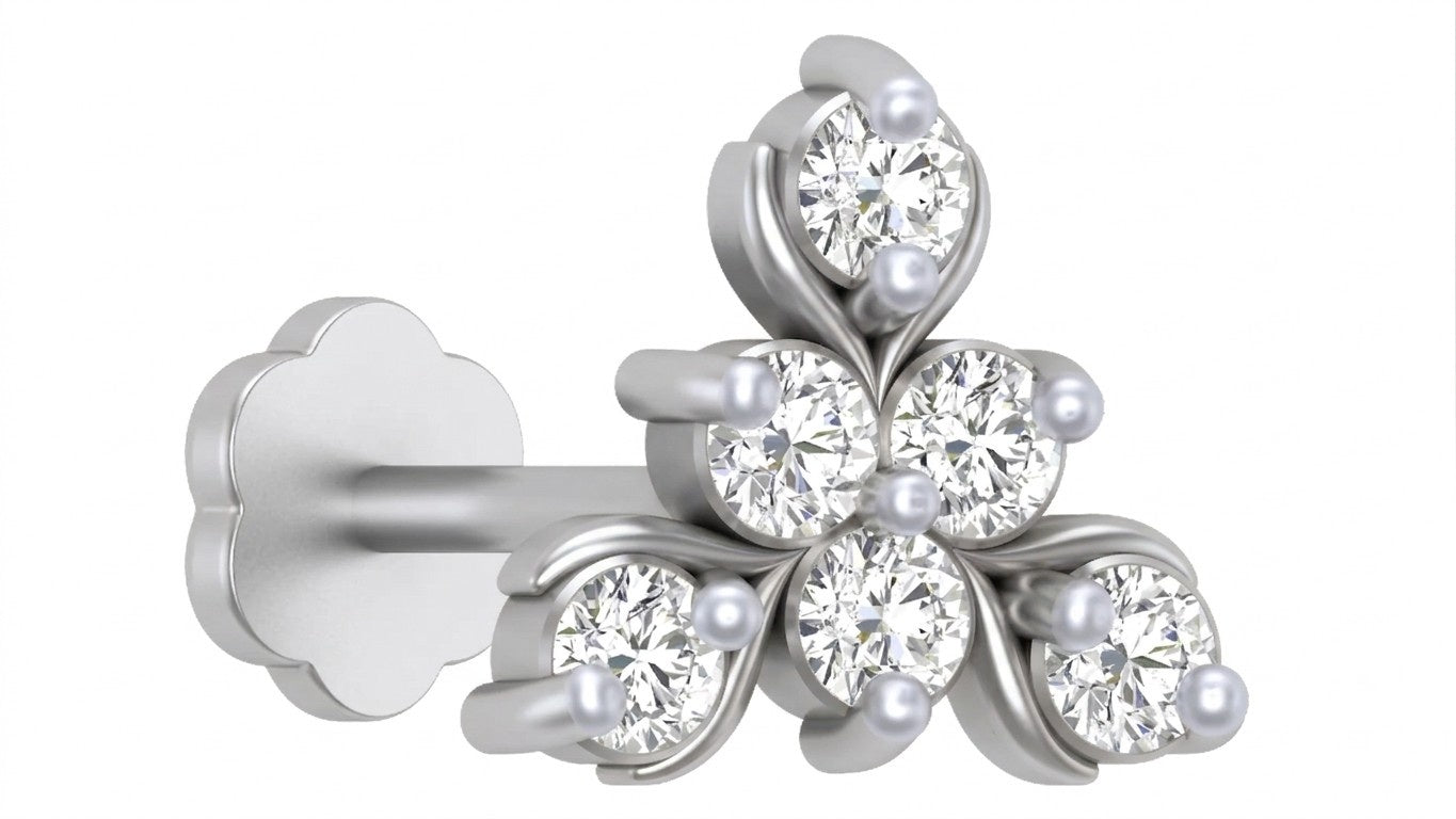 white gold and diamond stud nose pin on a white background