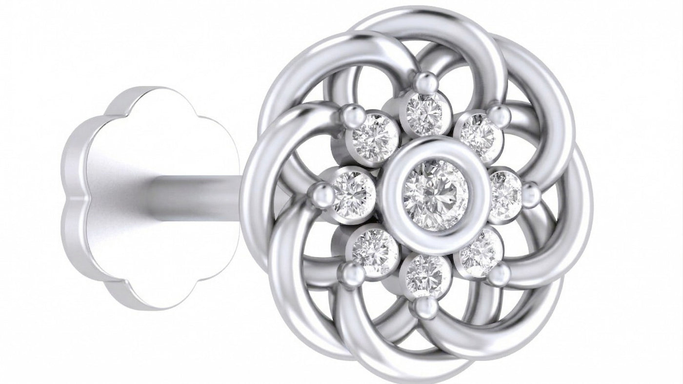 Elegant floral white gold and diamond nose pin featuring sparkling diamonds in an intricate circular design.