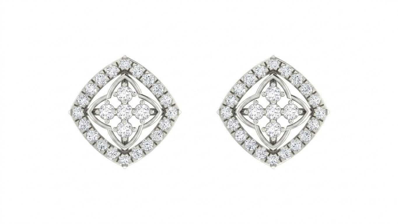Pair of white gold and diamond stud earrings on a white background.