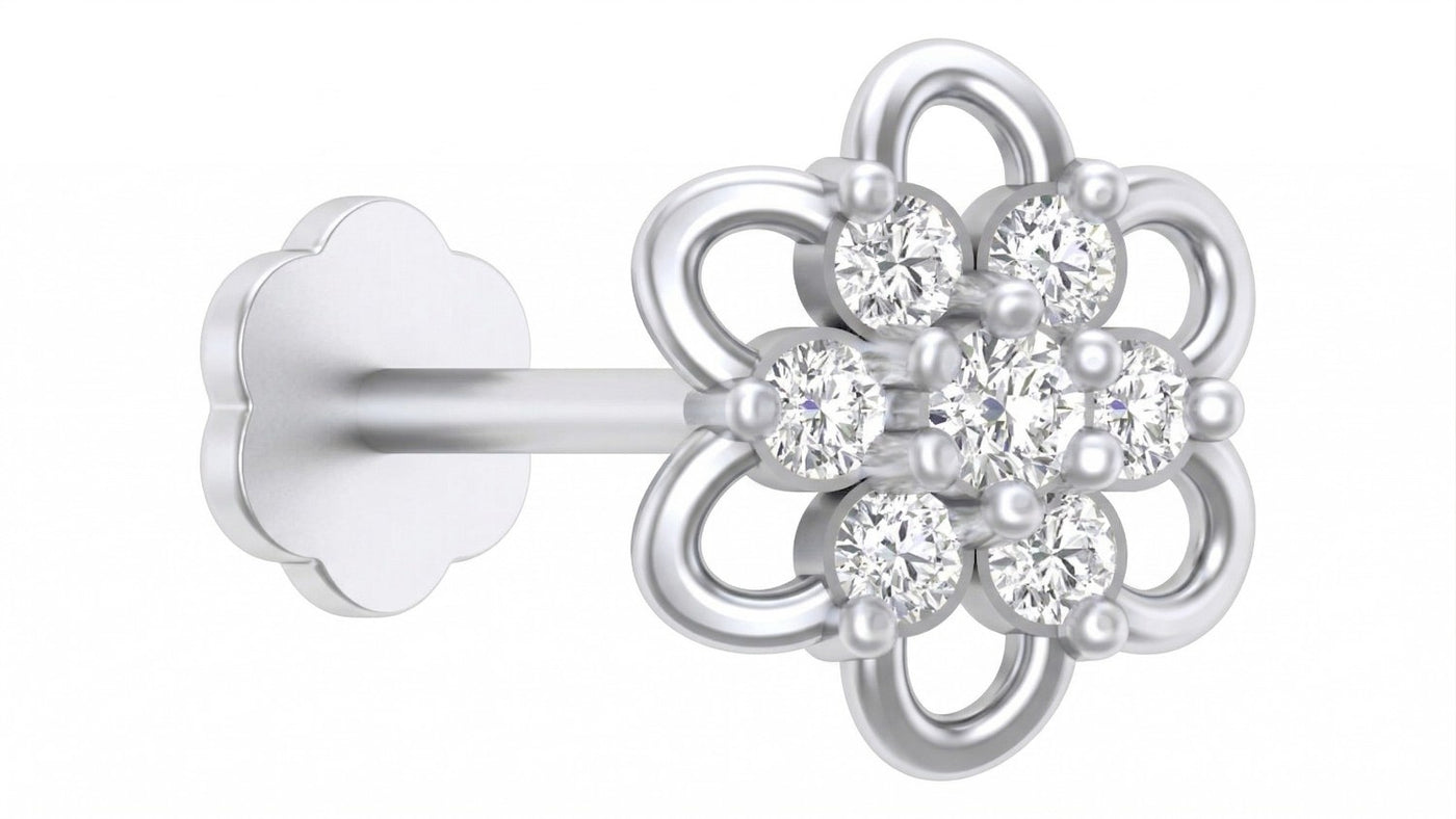 Elegant floral white gold and diamond stud nose pin in a delicate flower design.