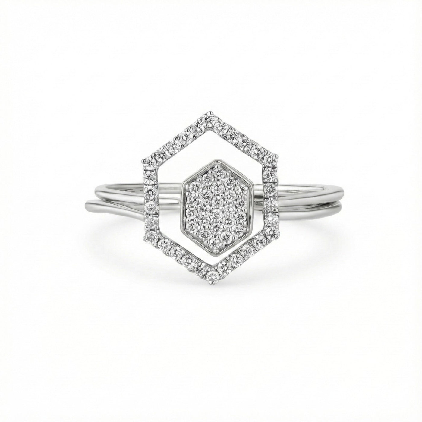 White gold ring with geometric design on a white background