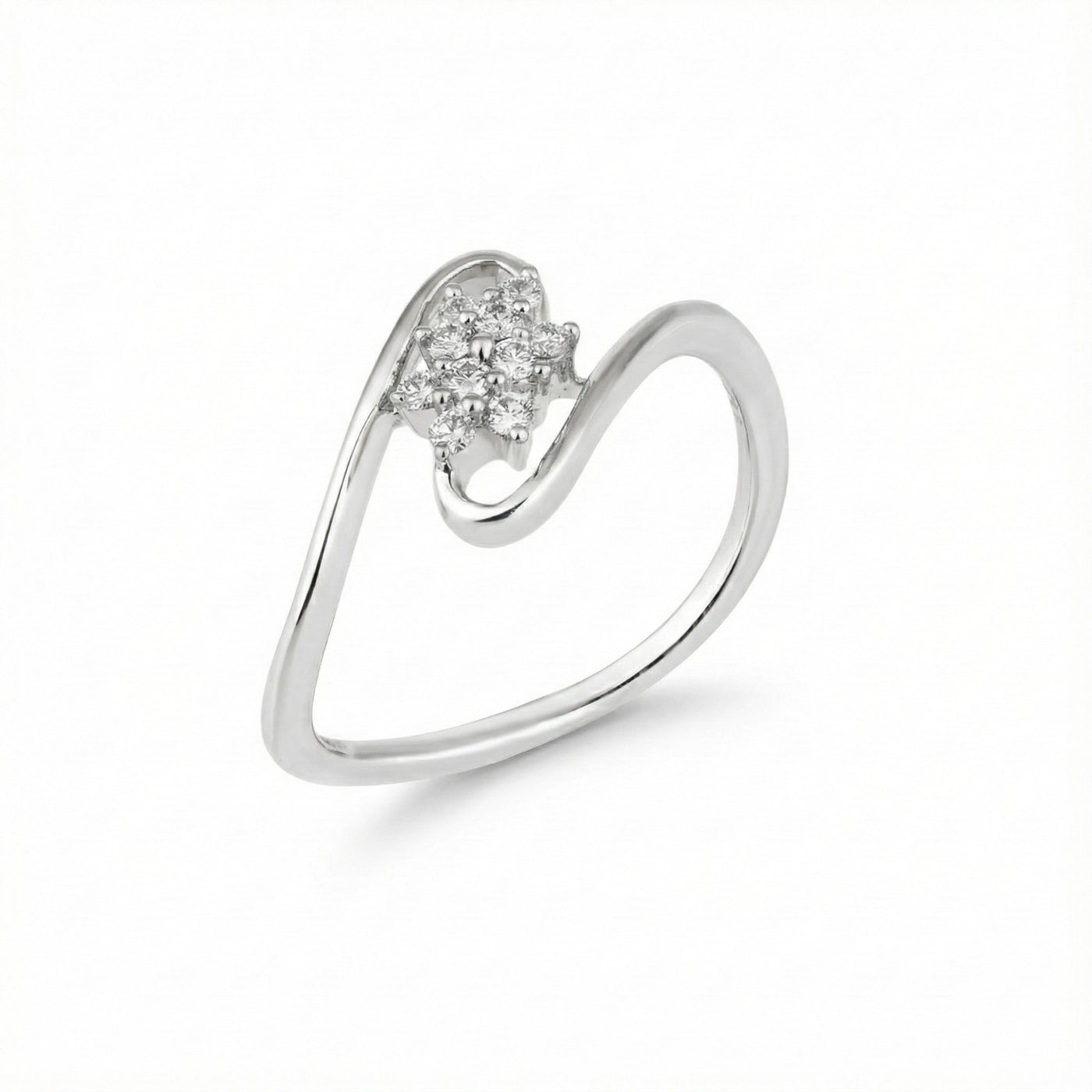 Yellow gold ring with a small diamond on a white background