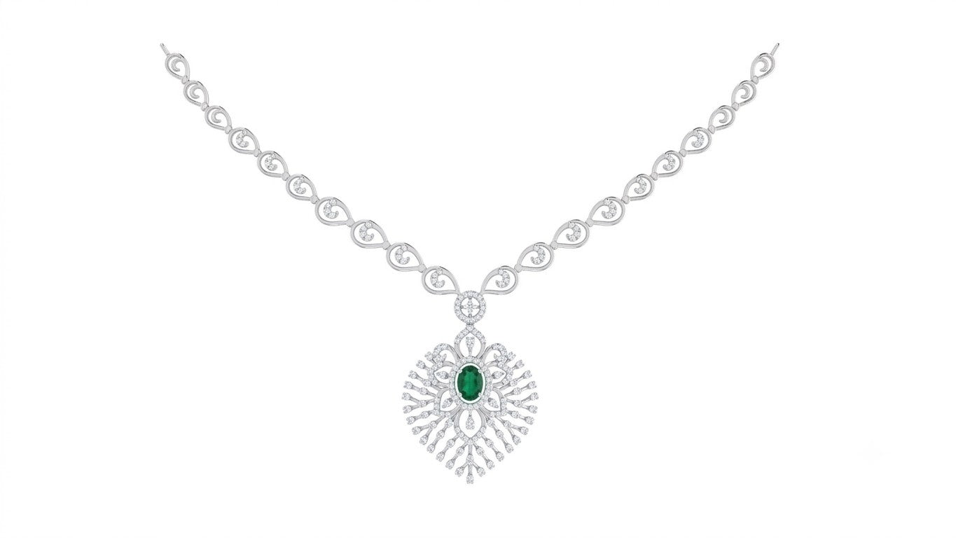 A white gold and diamond necklace featuring a central green gemstone, displayed on a solid white background.