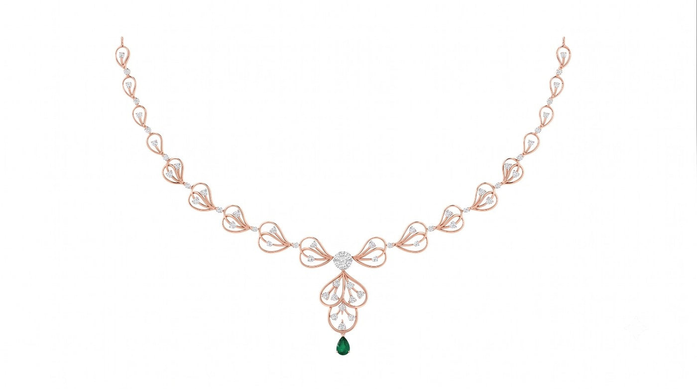 A rose gold and diamond necklace featuring a green teardrop gemstone, shown on a plain white background.
