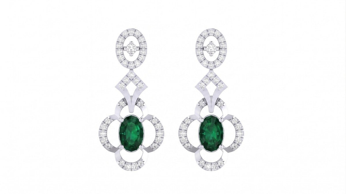 Pair of white gold and diamond earrings with green gemstones on a white background.