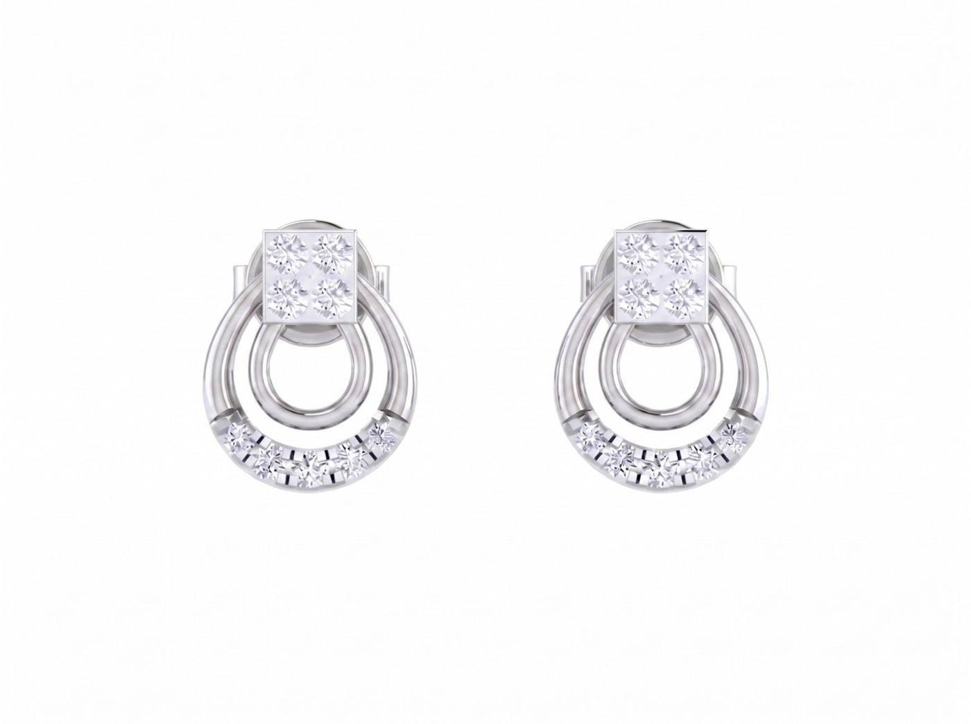 White gold and diamond stud earrings on a white background.