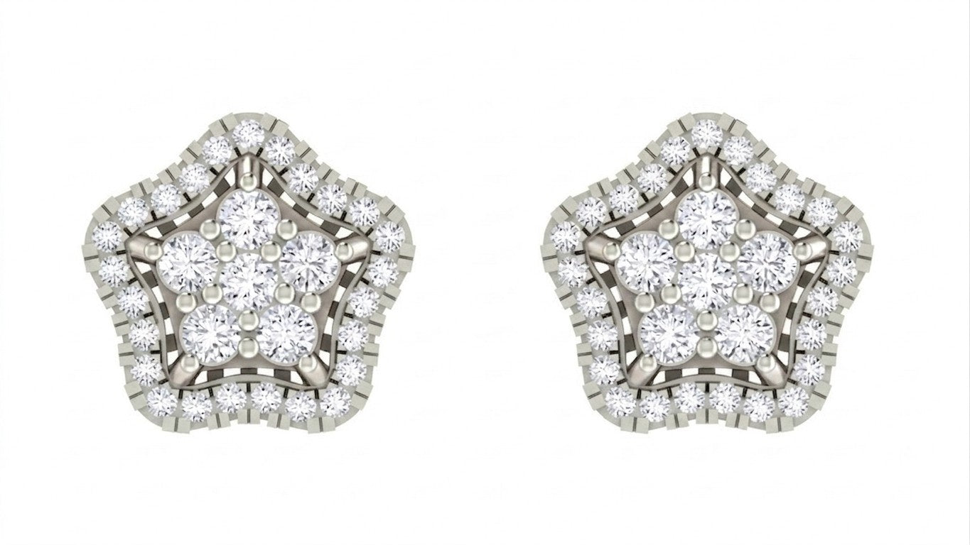 Star-shaped earrings with white gold and diamond detailing on a white background
