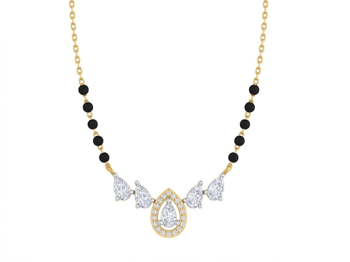 yellow gold and diamond mangalsutra with black beads and teardrop-shaped on a white background