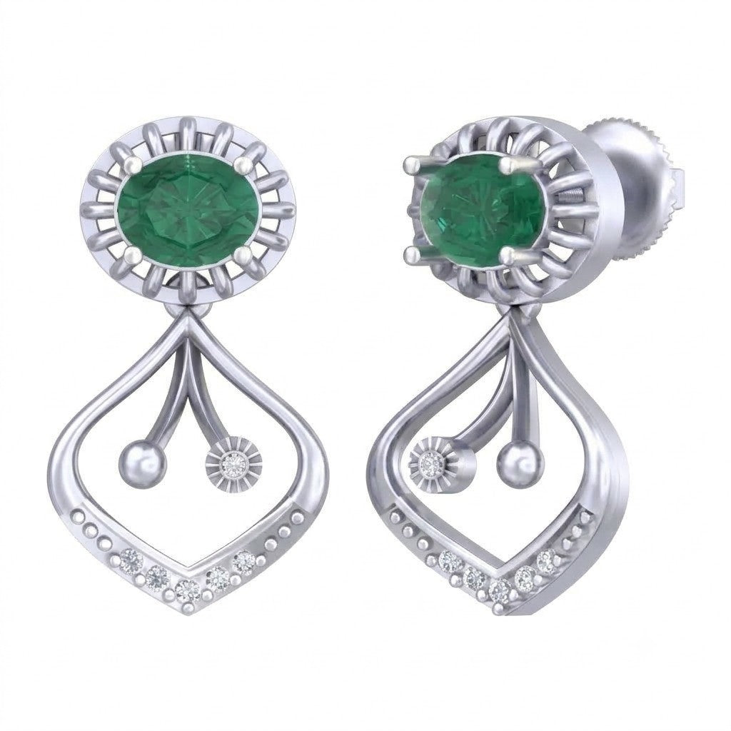 White gold and diamond earrings with emerald on a white background.