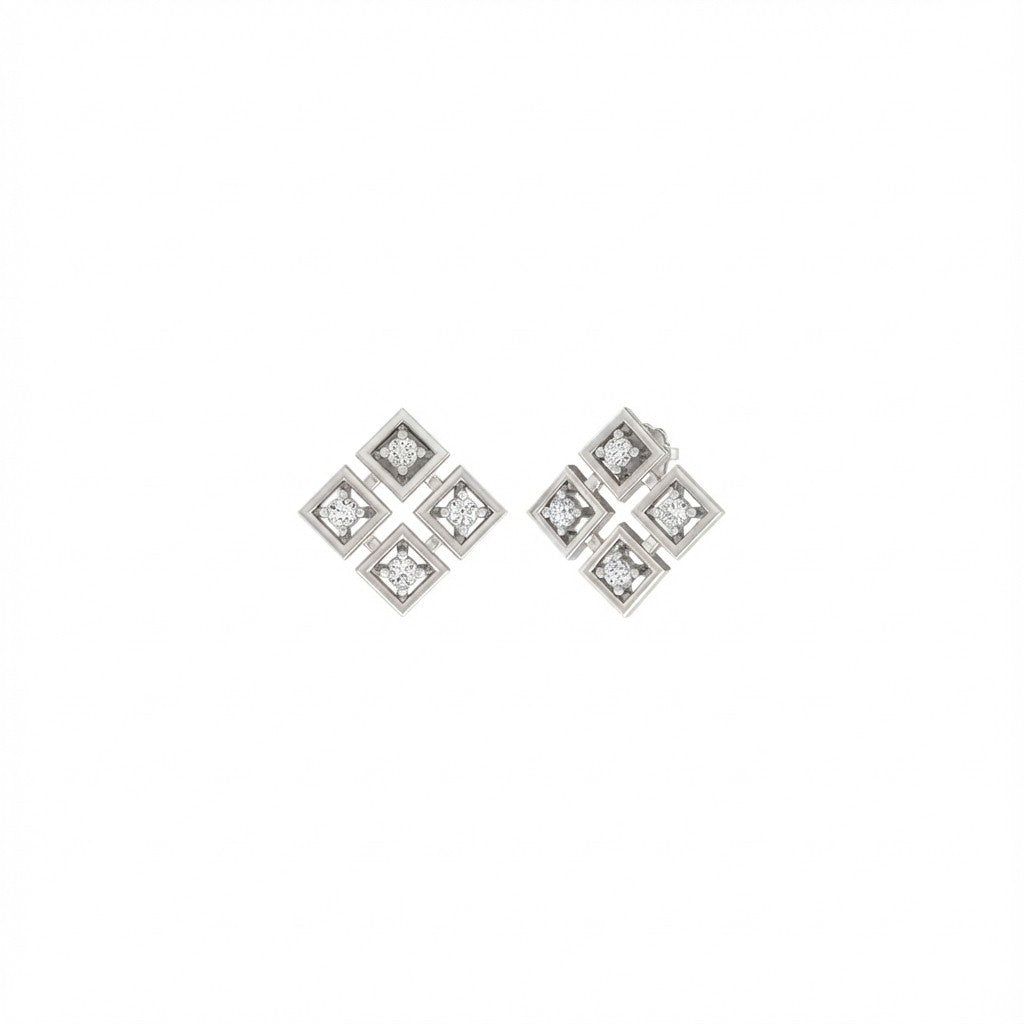 Pair of white gold and diamond stud earrings on a white background.