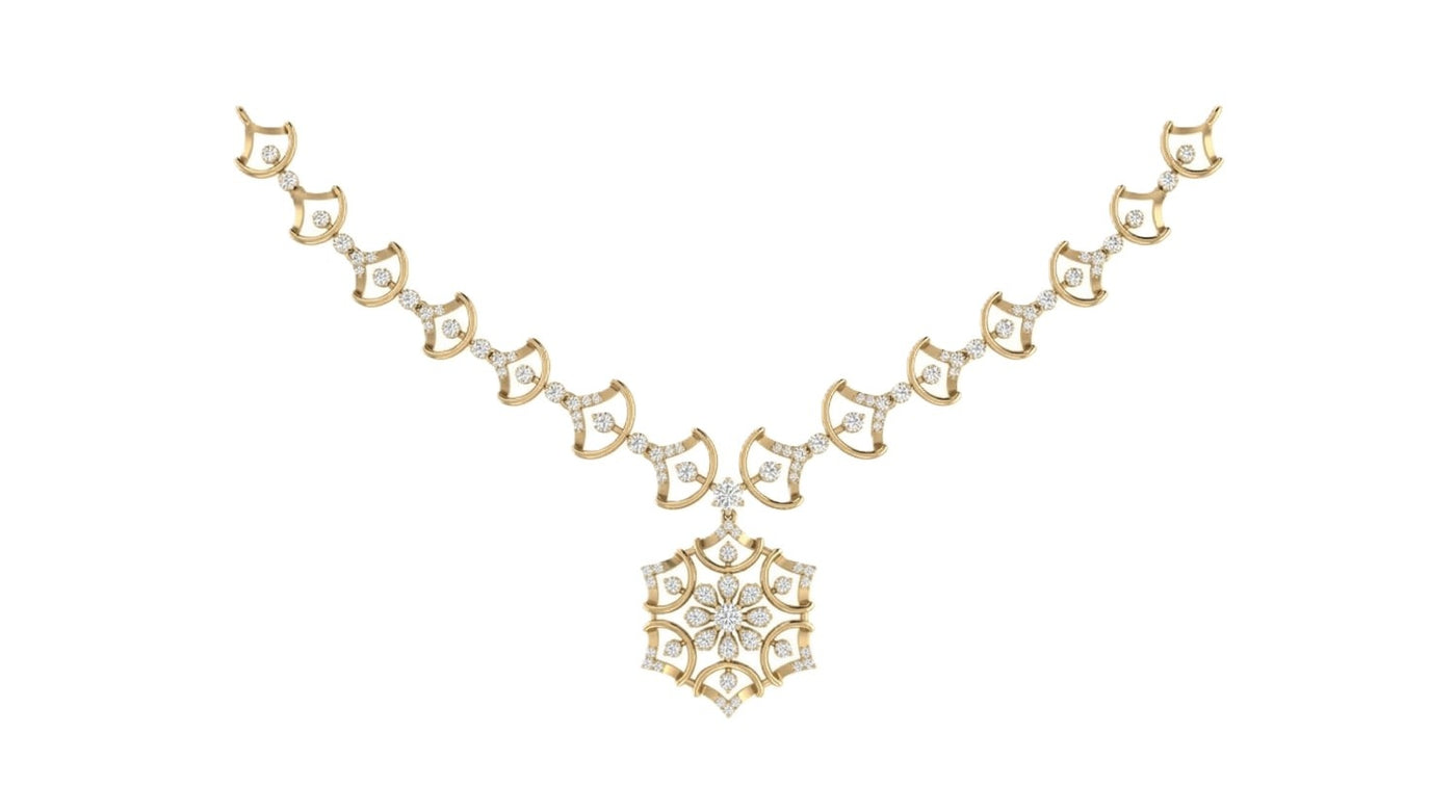 Yellow gold necklace with a snowflake design on a white background