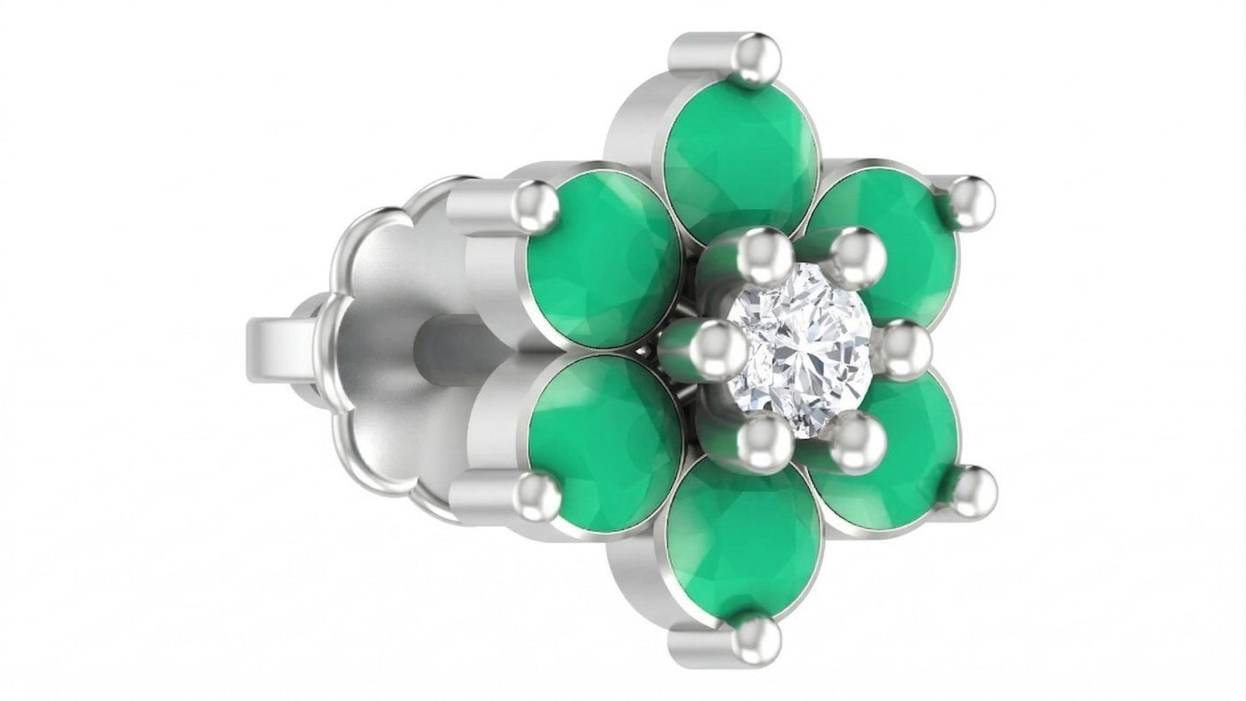 White Gold and diamond stud nose pin green gemstones and a diamond on a white background
