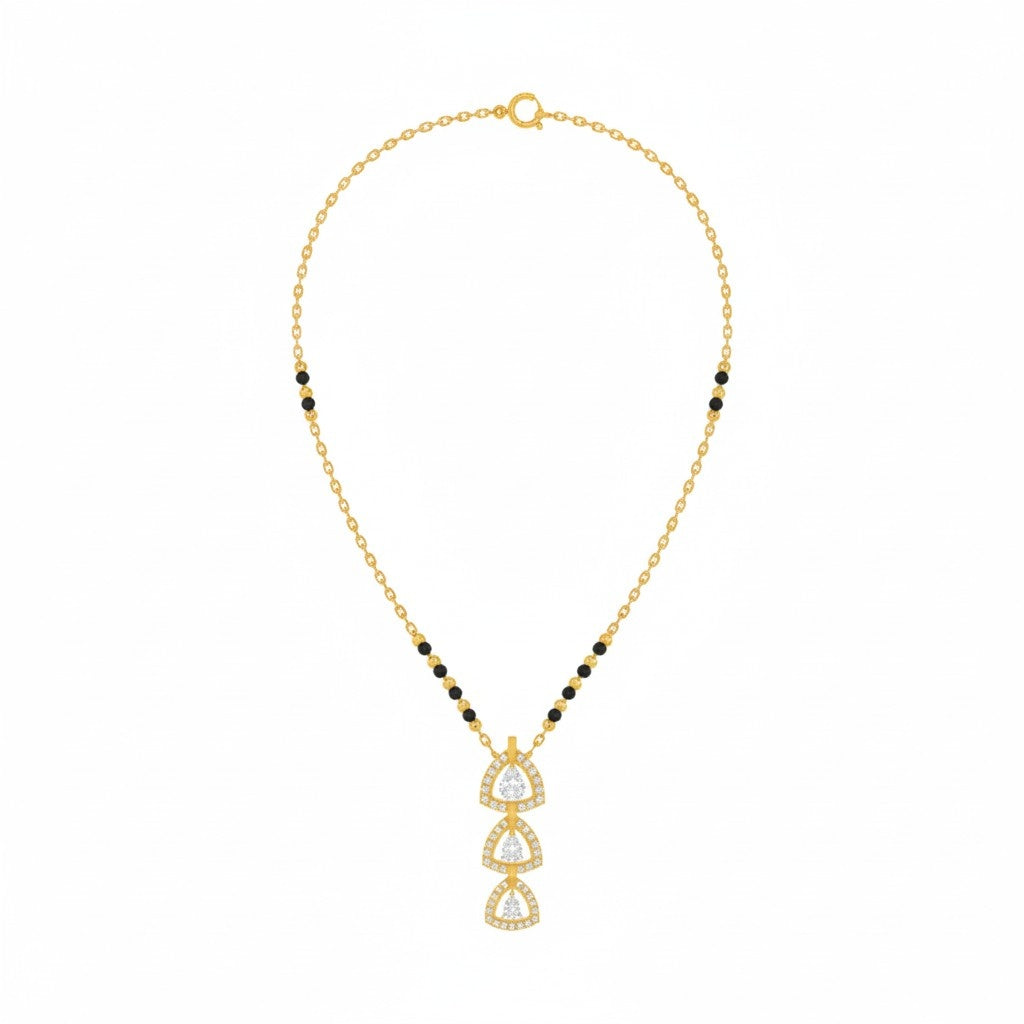 yellow gold mangalsutra on a white background 