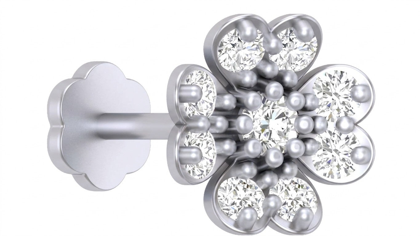 white gold and diamond stud nose pin with floral design and clear gemstones on a white background