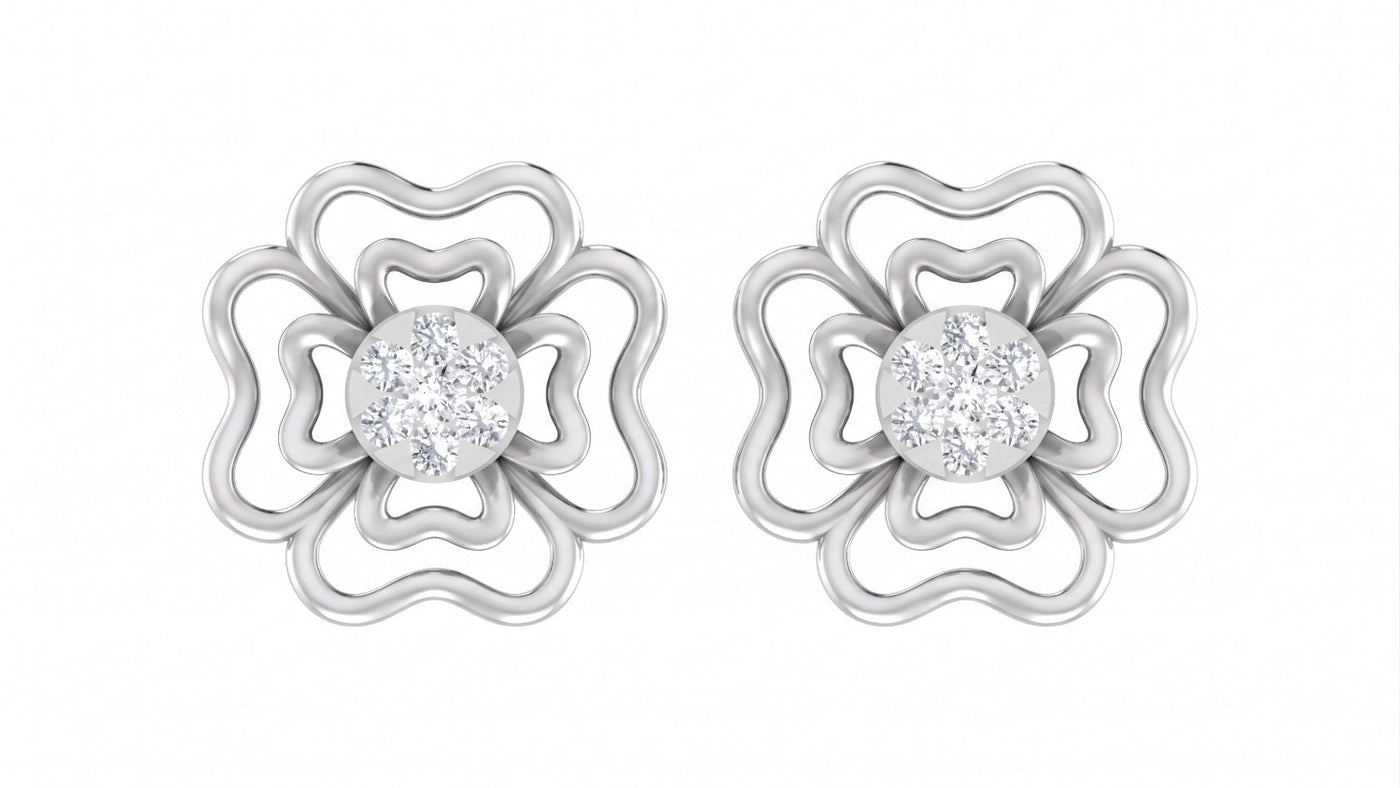 White gold and diamond floral stud  earrings on a white background