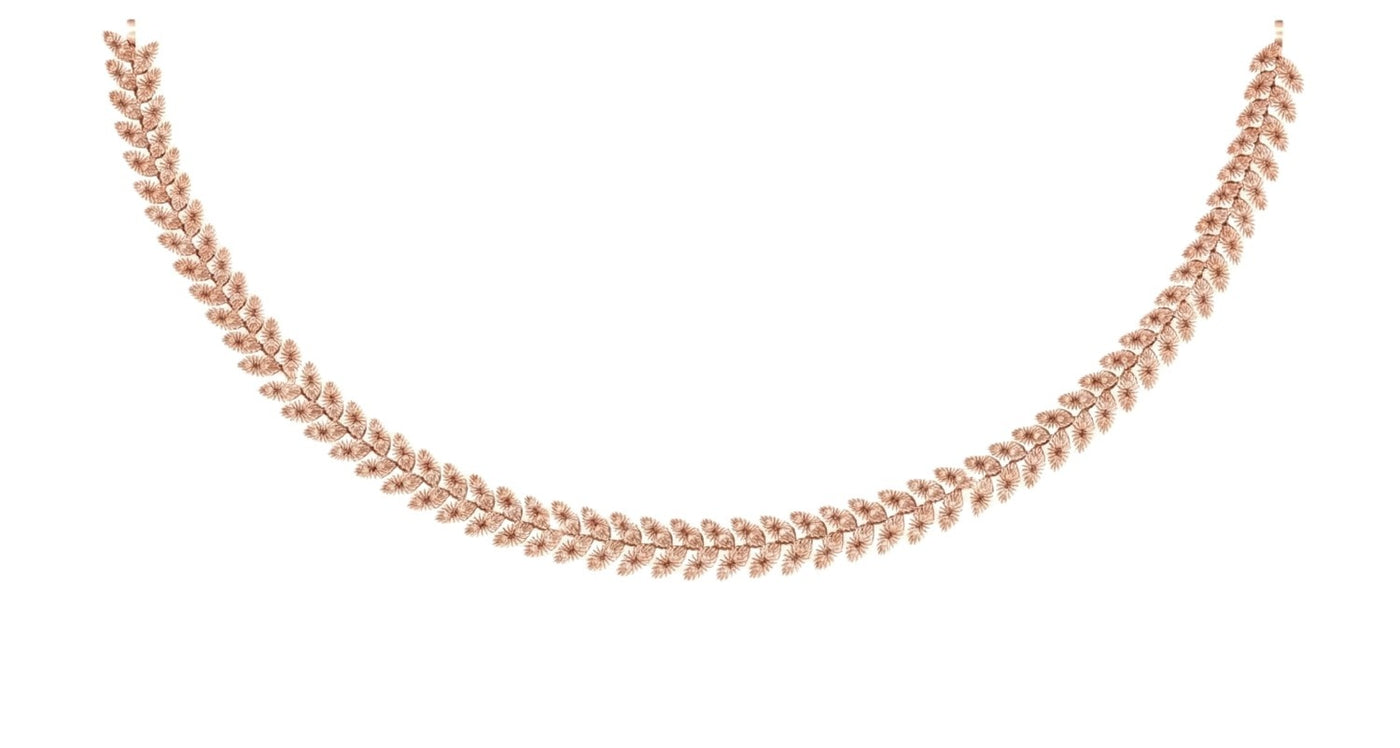 A rose gold chain necklace with a repeating leaf or motif, displayed against a solid white background.