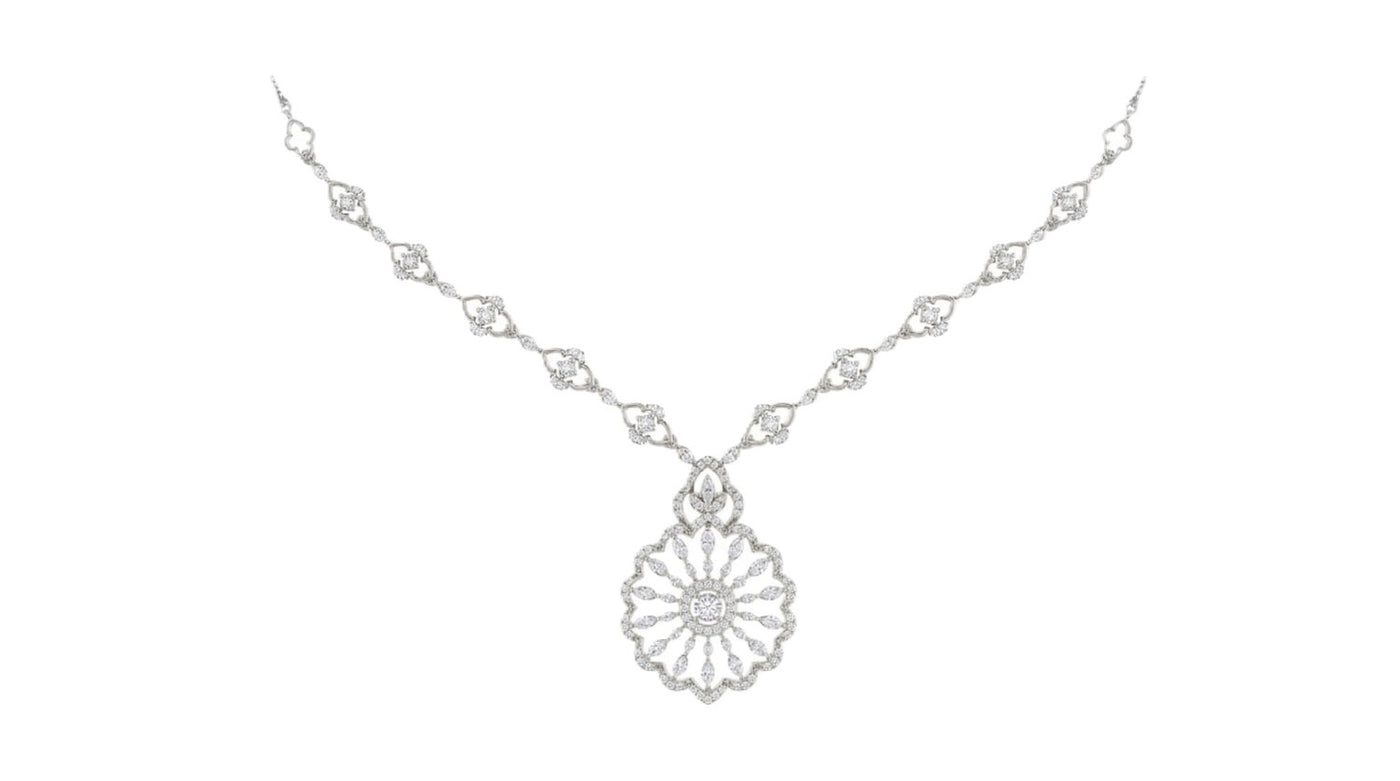 White gold necklace with a star-shaped on a white background
