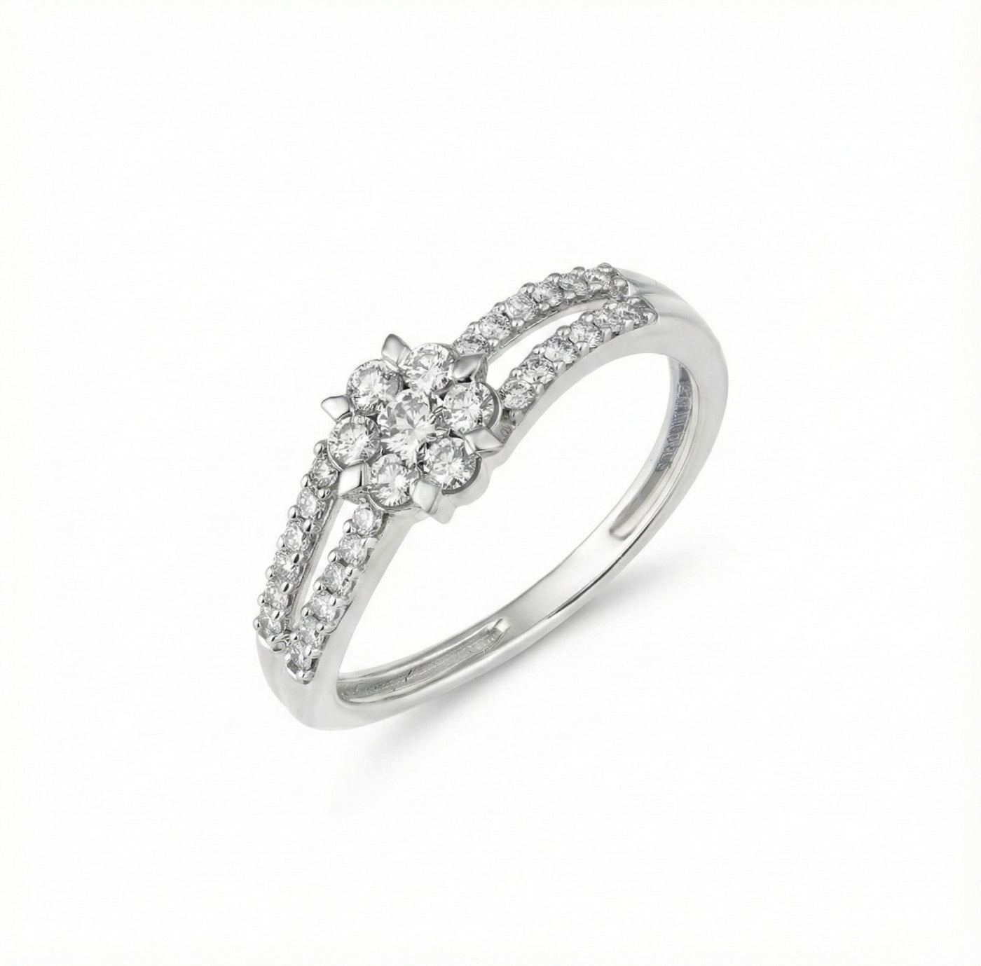 White gold ring with small diamonds on a white background