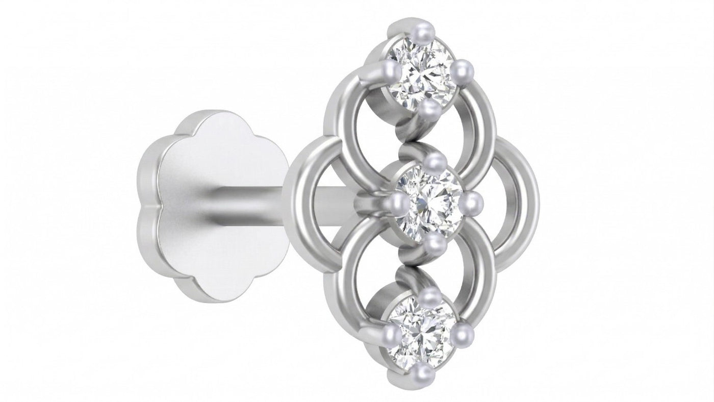 White gold and diamond stud nose pin with floral design on a white background