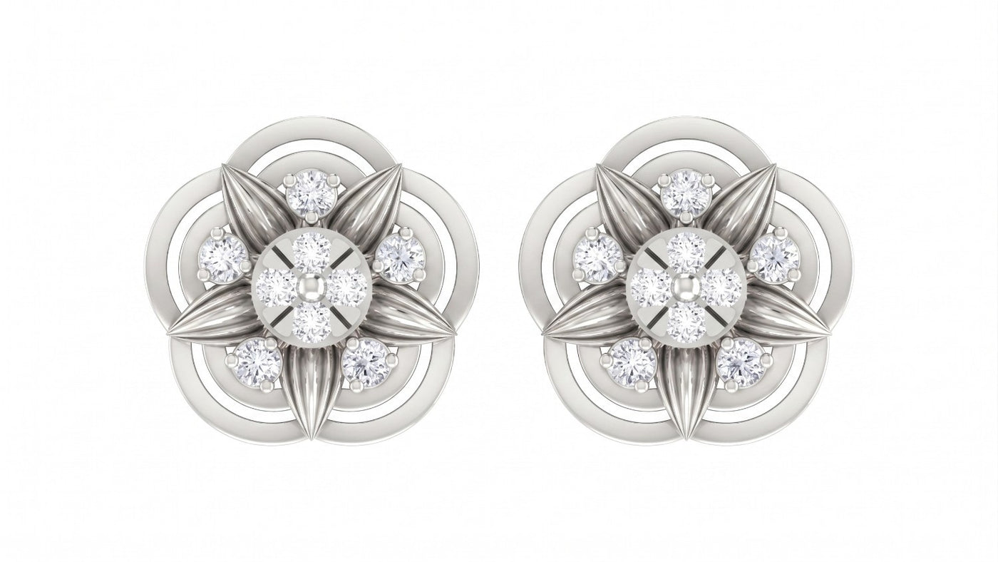 White gold and diamond floral stud earrings on a white background