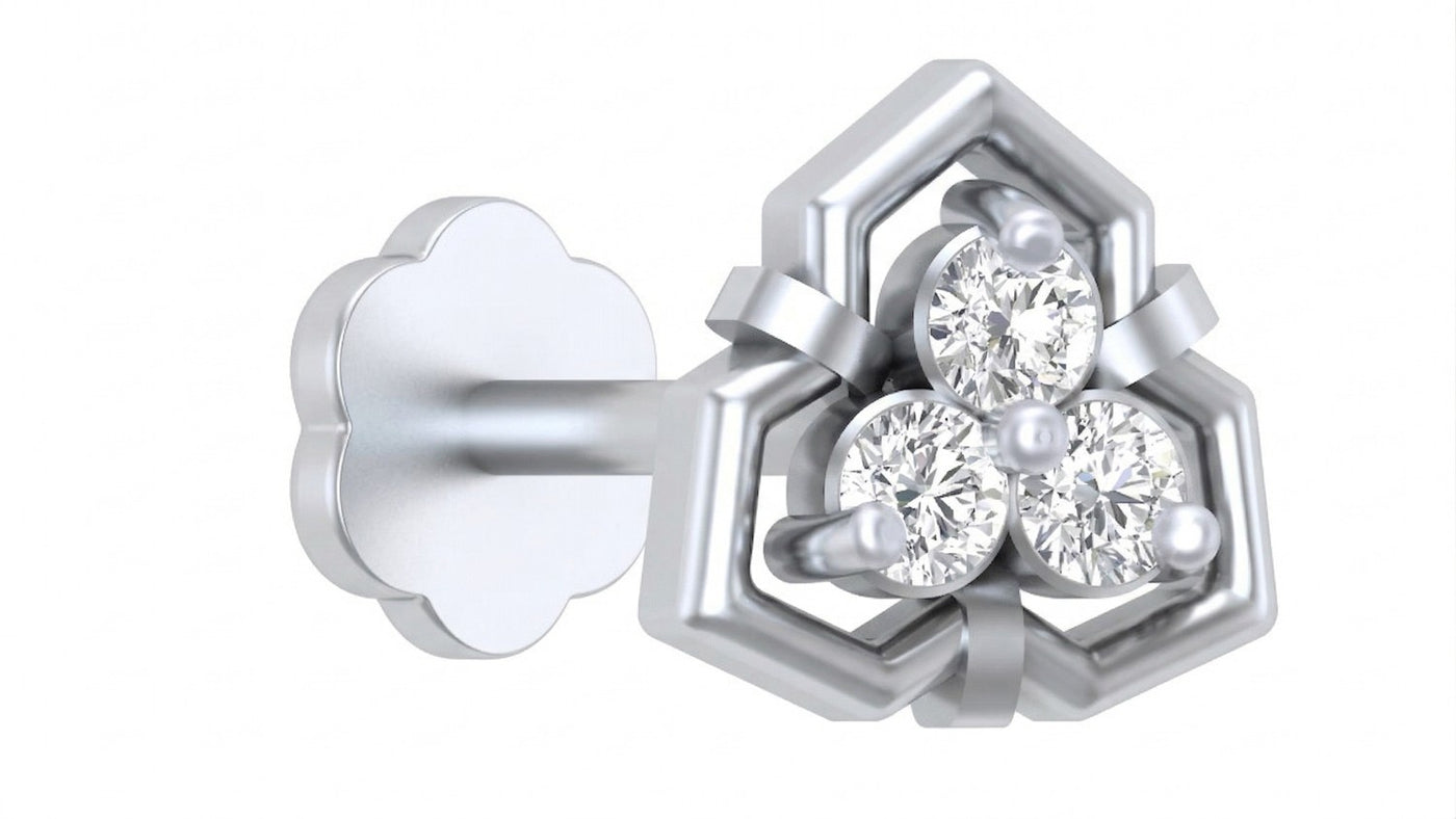 White gold and diamond stud nose pin stones on a white background