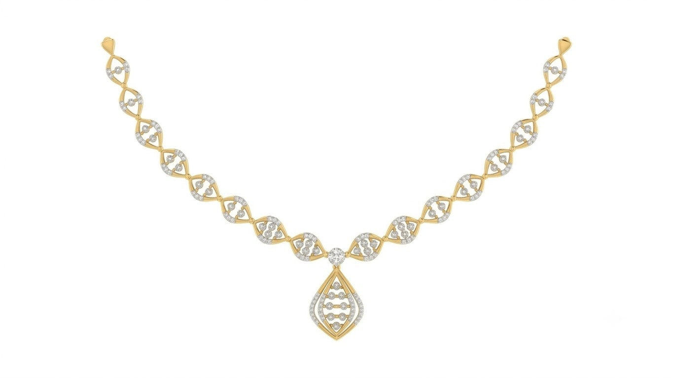 A yellow gold and diamond necklace featuring a central teardrop, displayed on a solid white background.