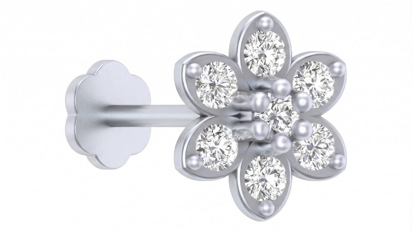 White gold and diamond stud nose pin on a white background