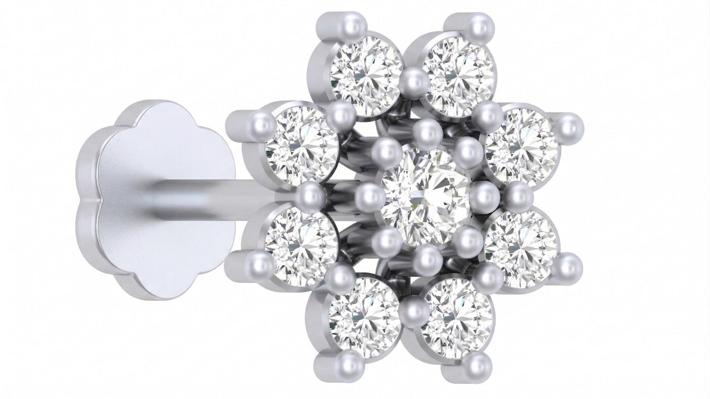 White gold and diamond stud nose pin on a white background